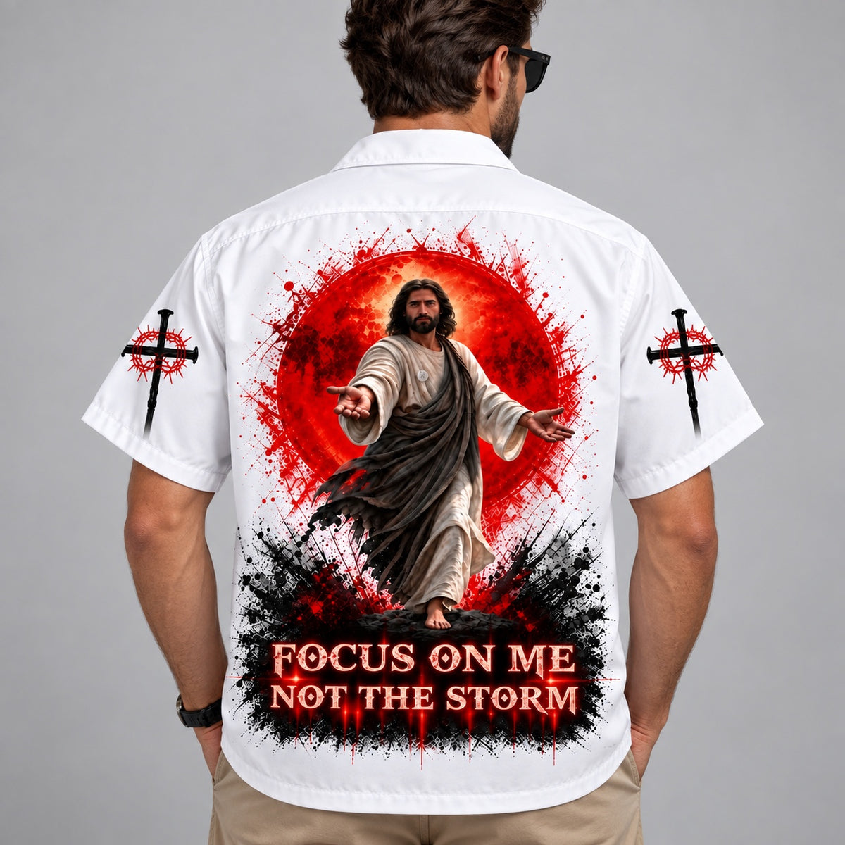 Studio back view of a man wearing the Focus On Me Not The Storm Christian Hawaiian shirt