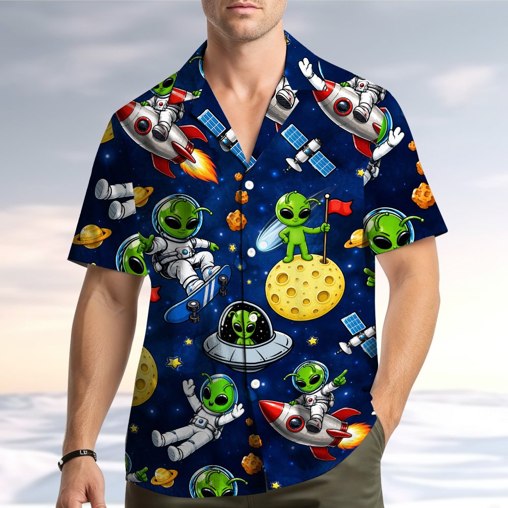 Lifestyle view of a family wearing matching space aliens hawaiian shirts