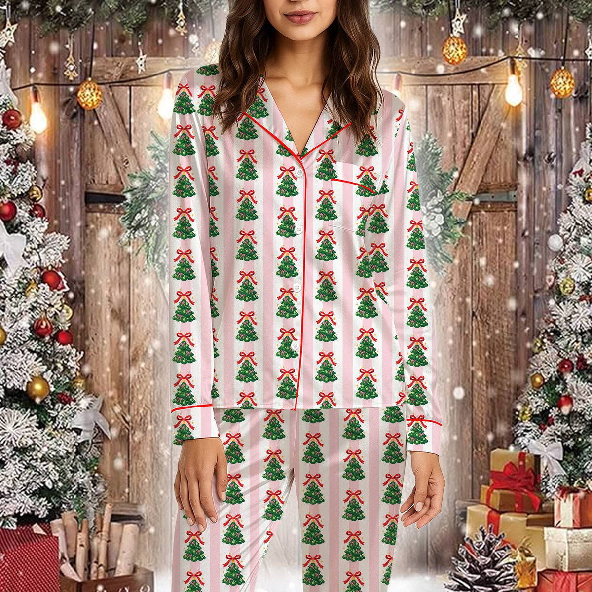Front view of the matching xmas family pajamas with red bows on green trees