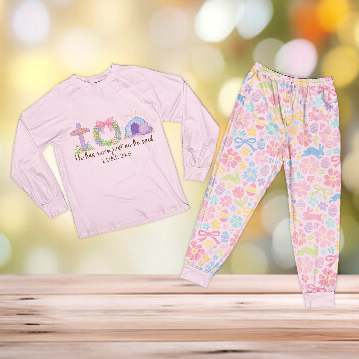 Another front view of the pink faith pajama set featuring the He has risen design