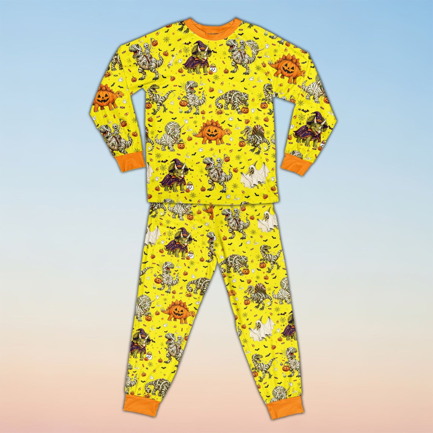 Detail view of the solid orange collar and cuffs on the Halloween pajama set