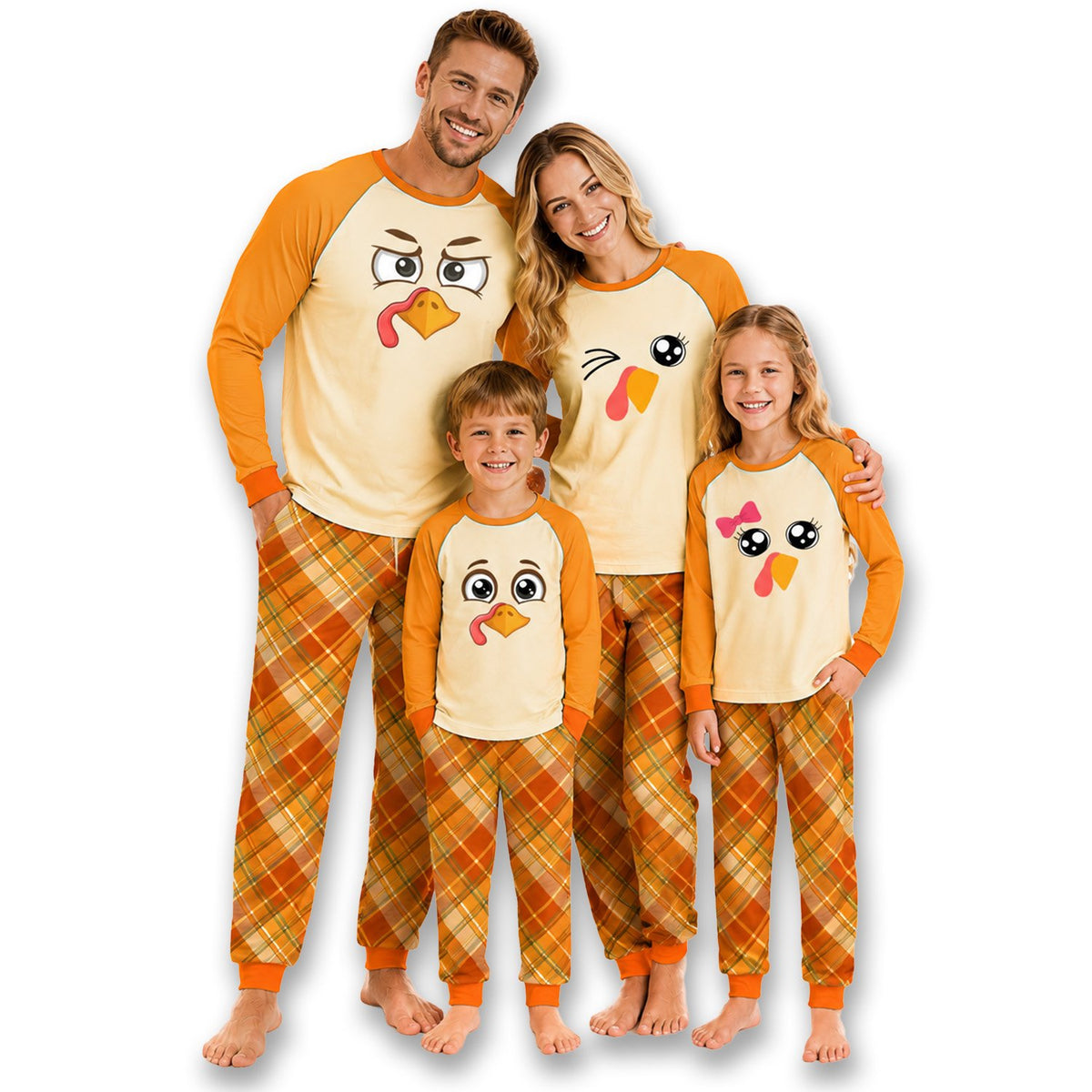 Lifestyle view of family wearing matching Thanksgiving pajama sets with turkey faces and plaid pants