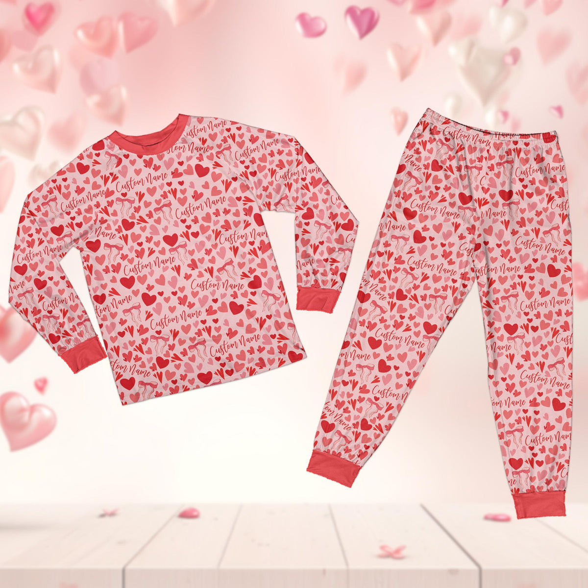 Valentines pajama set showing all-over print of hearts and bows, front view 4