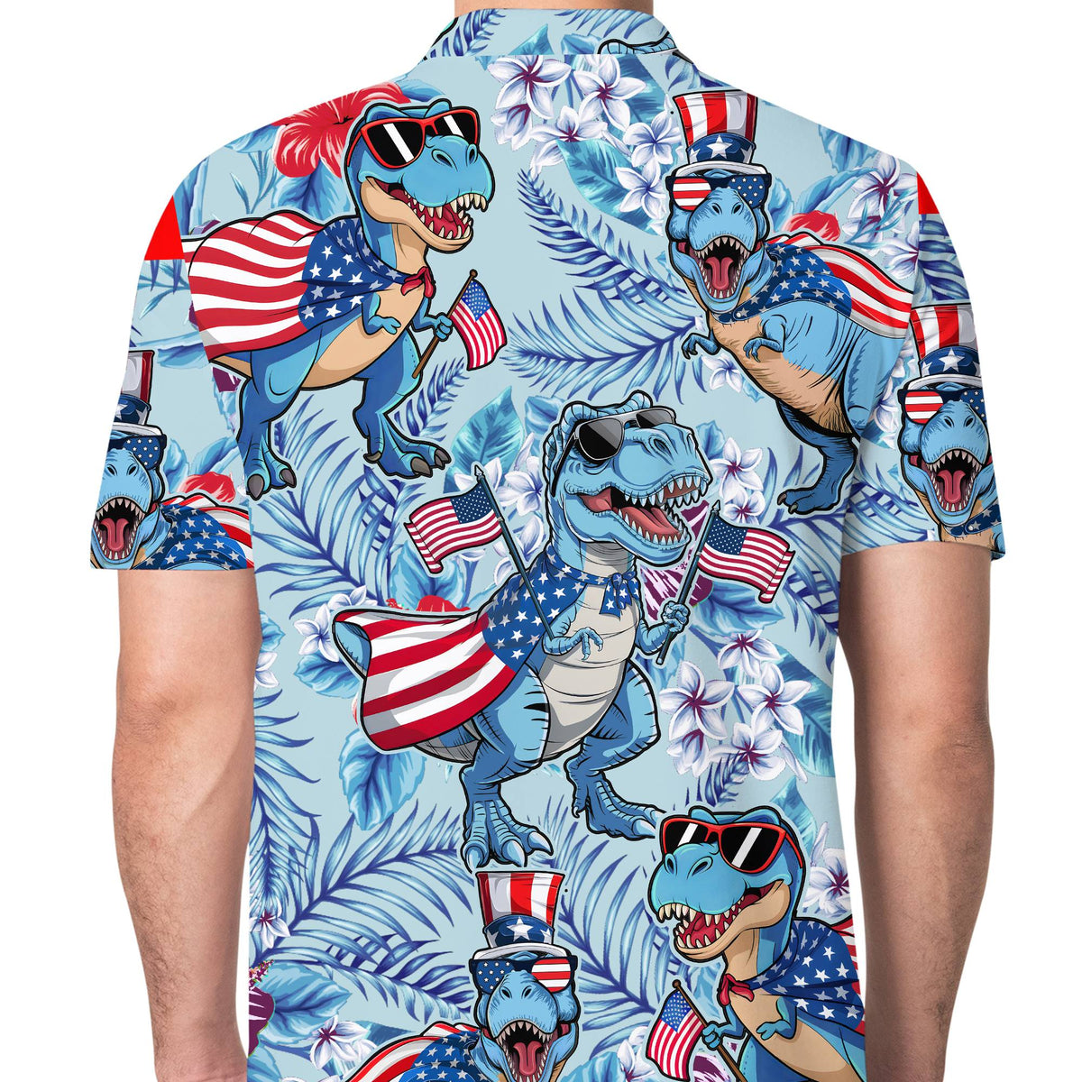 Close-up lifestyle view highlighting the vibrant tropical and dinosaur print on the polo shirt