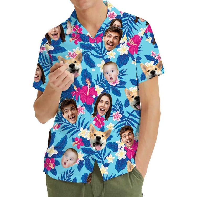 Man wearing custom face Hawaiian shirt with photo faces printed between blue hibiscus flowers