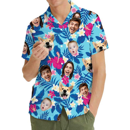 Man wearing custom face Hawaiian shirt with photo faces printed between blue hibiscus flowers
