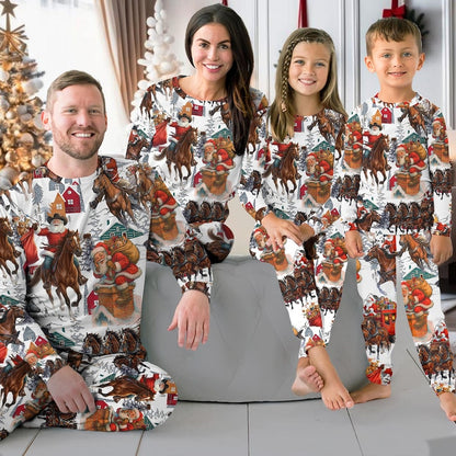 Family wearing matching Western Santa riding horse Christmas pajamas by the tree