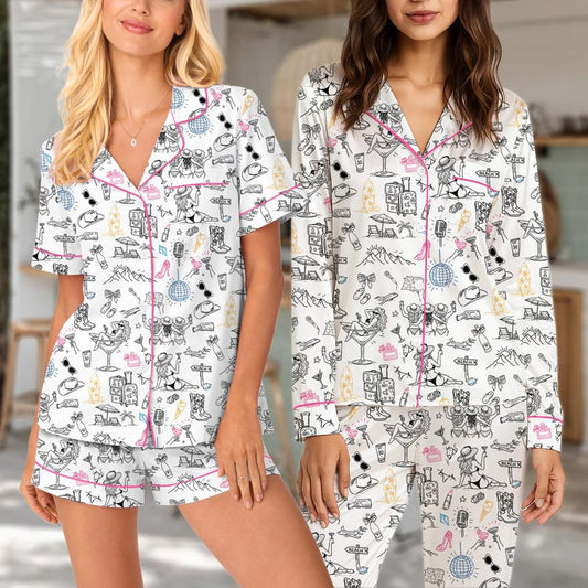 Two women wearing Girls Trip beach print pajama sets, short set and long set