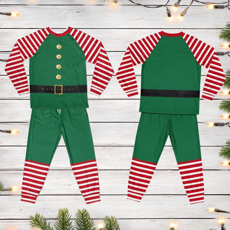 Christmas elf family pajama set flat lay, green top with belt print and red striped pants