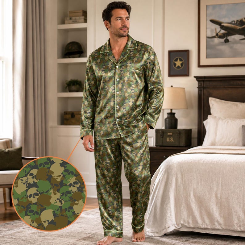Man standing in bedroom wearing skull camo satin pajama set