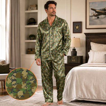 Man standing in bedroom wearing skull camo satin pajama set