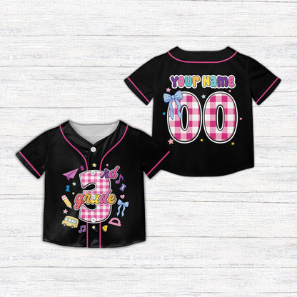 Black custom kids jersey featuring school supplies and stars, front view
