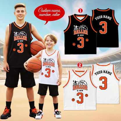 Kid proudly showing off the custom name and number on the back of the jersey