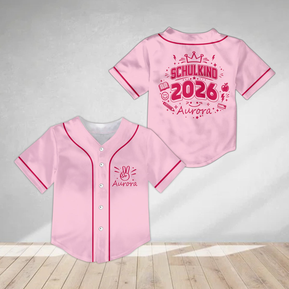 Pink personalized kids jersey showing the front pocket peace sign graphic