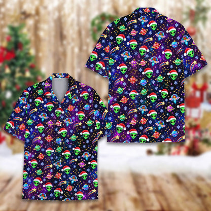 Close-up of the green aliens wearing red Santa hats on the Hawaiian shirt