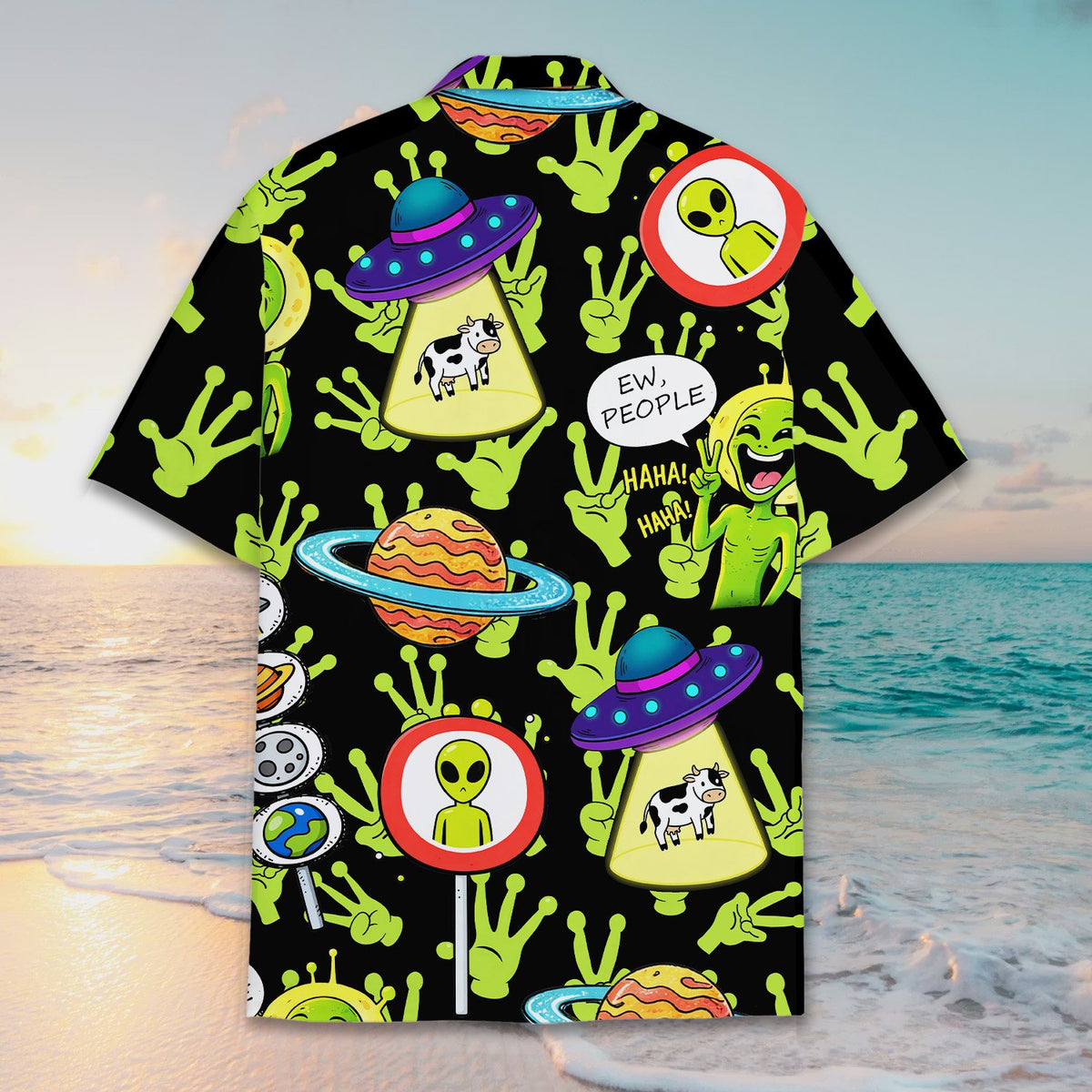 Group wearing matching family hawaiian shirts with alien design