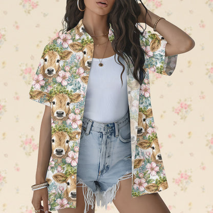 Child smiling while wearing the animal floral hawaiian shirt, lifestyle view