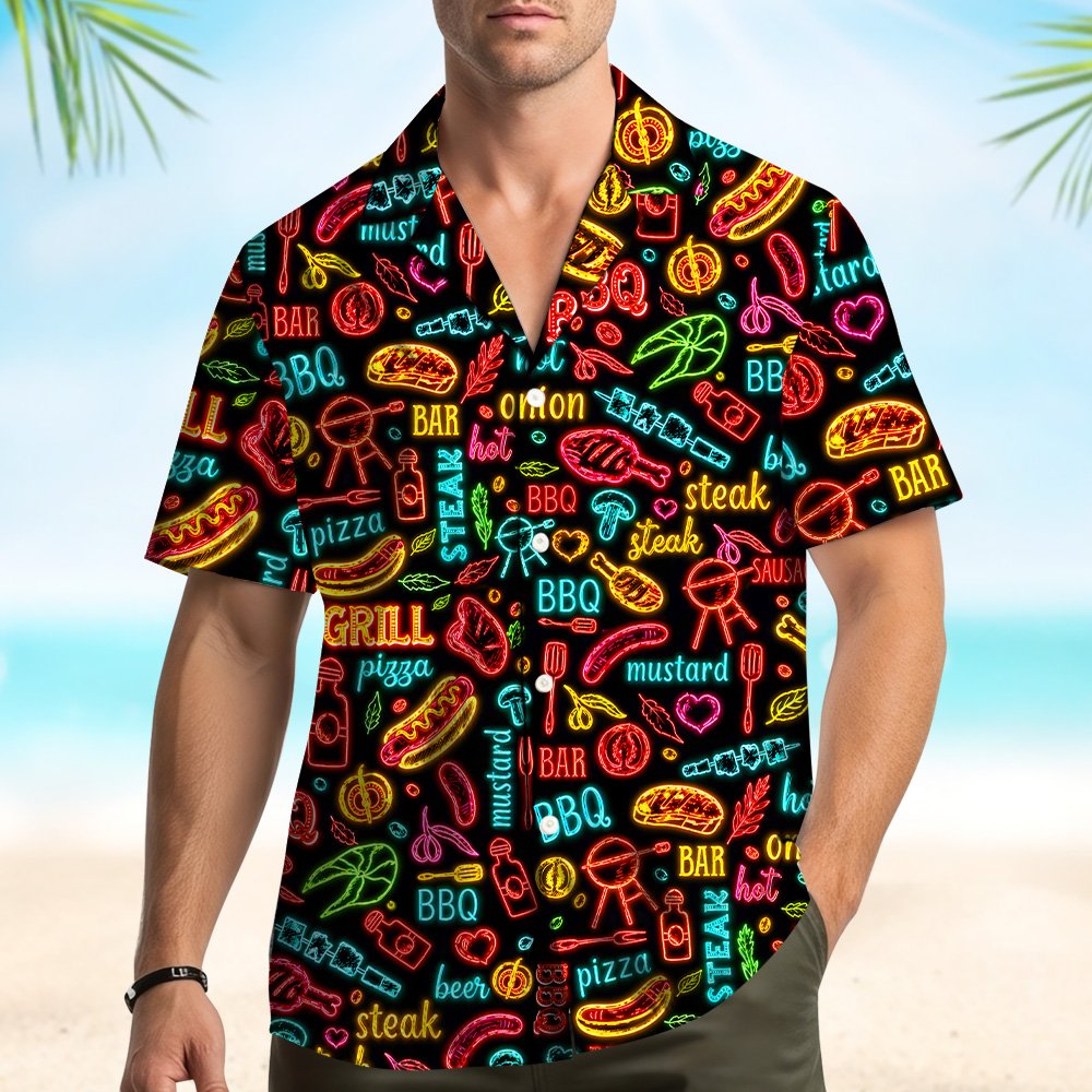 Group wearing matching family hawaiian shirts with bbq design outdoors