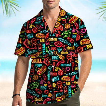 Group wearing matching family hawaiian shirts with bbq design outdoors