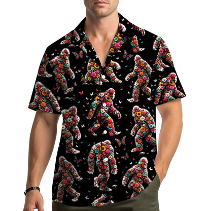 Lifestyle view of a person wearing the black floral hawaiian shirt outdoors