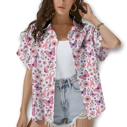 Breast cancer awareness hawaiian shirt with pink ribbons and flowers, flat lay front view