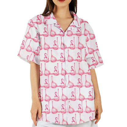 Lifestyle view of an adult wearing the breast cancer awareness hawaiian shirt