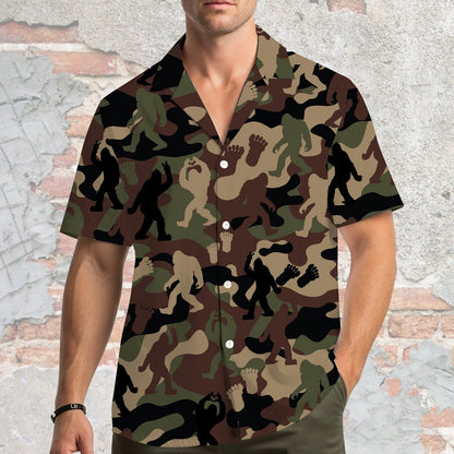 Person wearing camo bigfoot hawaiian shirt outdoors