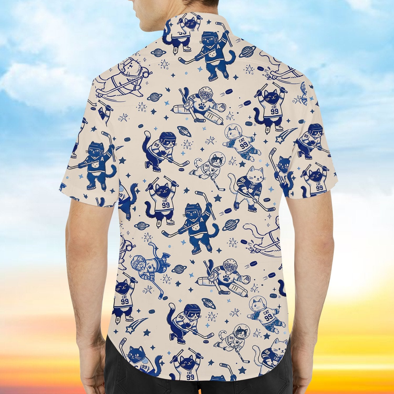 Group wearing matching family hawaiian shirts featuring hockey cats