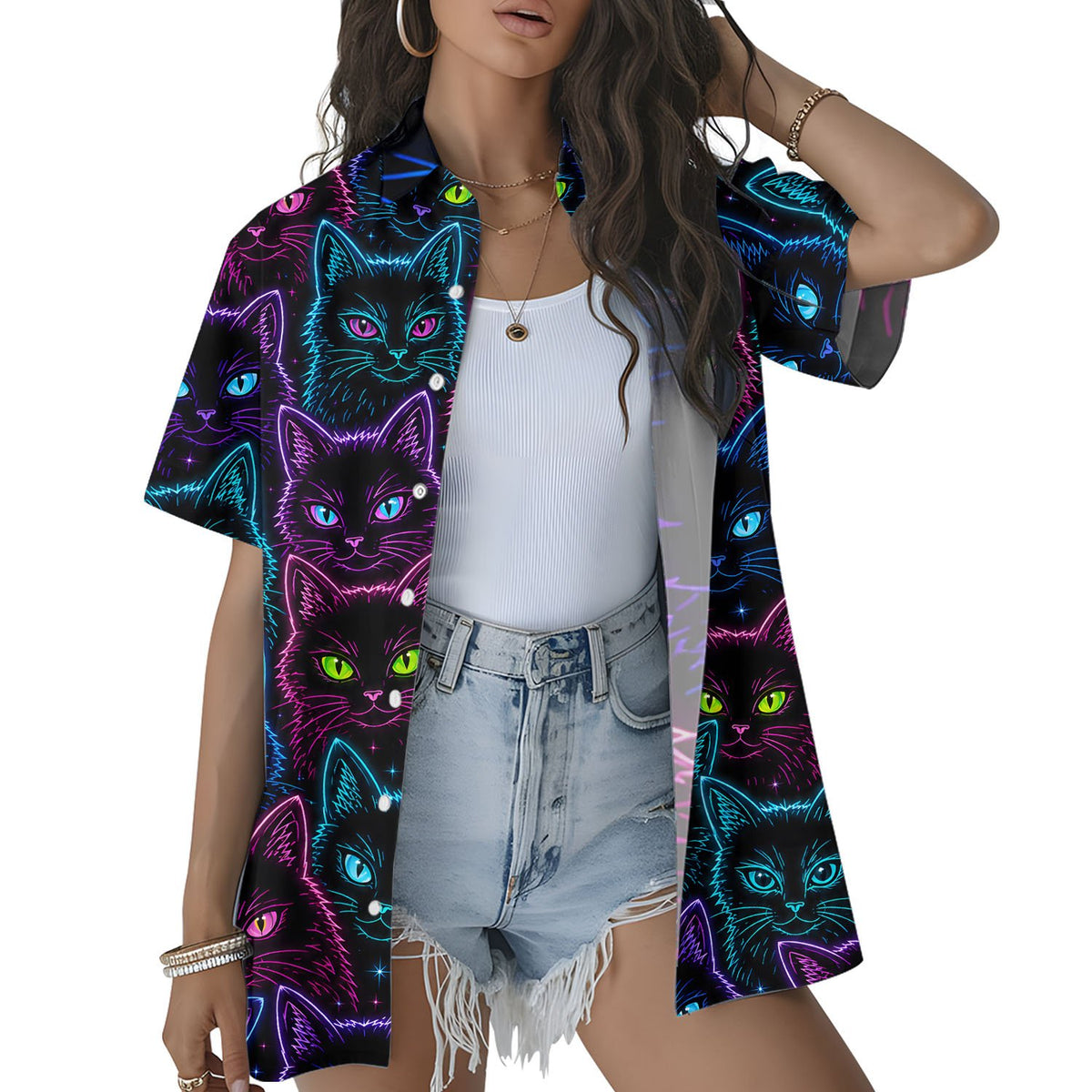 Close-up lifestyle view of neon pink, blue, and green cat outlines on dark shirt