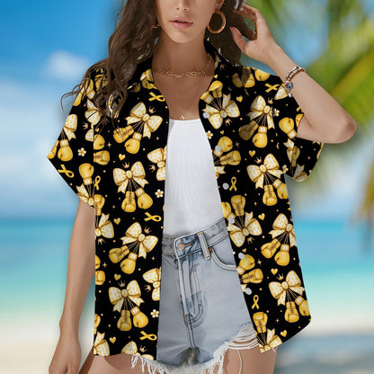 Close up lifestyle shot of the childhood cancer awareness hawaiian shirt