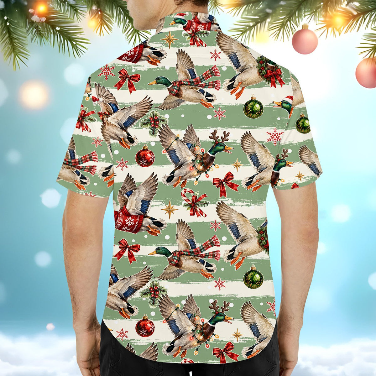 Second lifestyle image of someone wearing the matching family Hawaiian shirt with festive waterfowl pattern