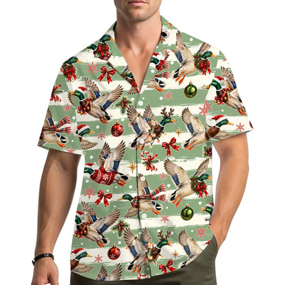 Lifestyle image of someone wearing the matching family Hawaiian shirt with festive waterfowl pattern
