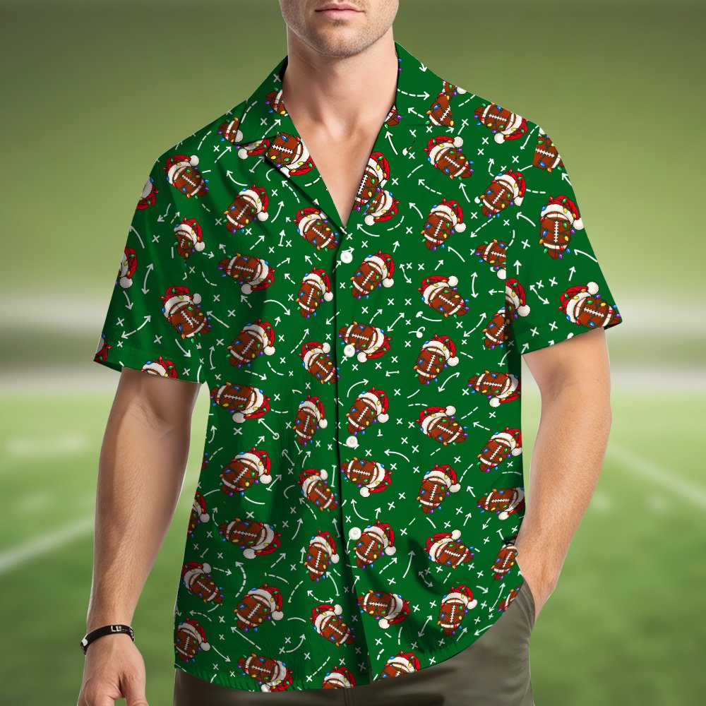 Main view of the green christmas football hawaiian shirt featuring Santa hat footballs and lights