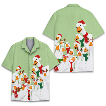 Main view of the matching family Hawaiian shirts featuring a Christmas goose design