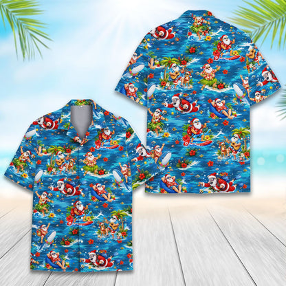 Front detail of the blue hawaiian shirt with hibiscus and palm trees