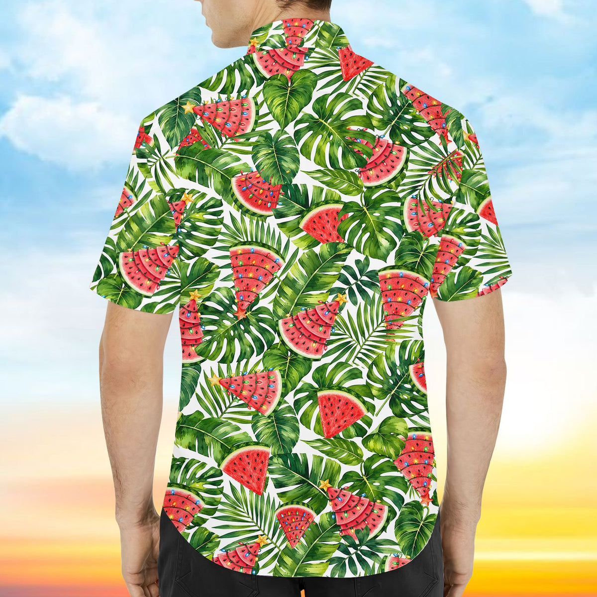 Lifestyle shot highlighting the colorful lights and star on the watermelon trees of the hawaiian shirt