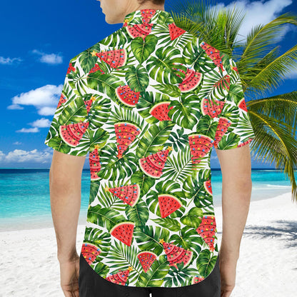 Close-up lifestyle view of the tropical palm and monstera leaf pattern on the matching family shirt
