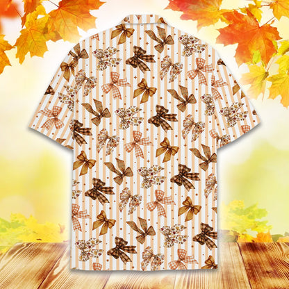 Lifestyle shot of a family wearing matching fall bows hawaiian shirts outdoors