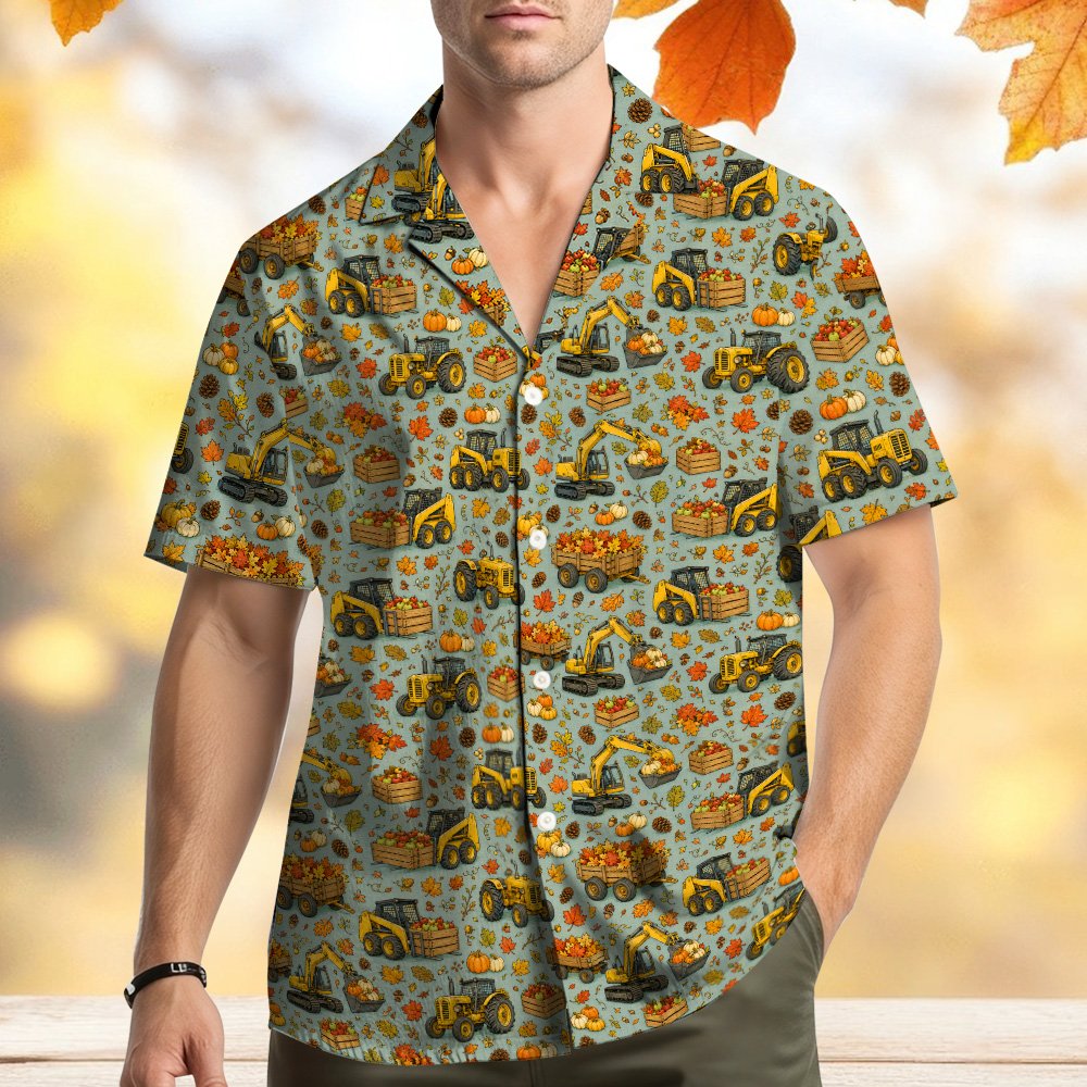 Front view of the green fall Hawaiian shirt with construction vehicles and pumpkins
