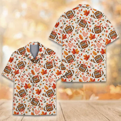 Detailed front view of fall football leopard hawaiian shirt on cream background