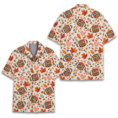 Front view of matching family hawaiian shirt with autumn leaves and football design