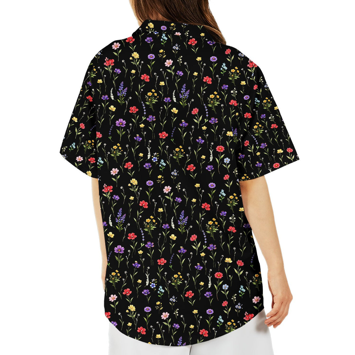 Black floral hawaiian shirt featuring scattered wildflowers, back view