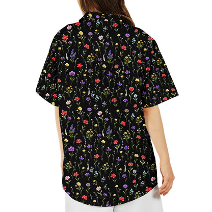 Black floral hawaiian shirt featuring scattered wildflowers, back view