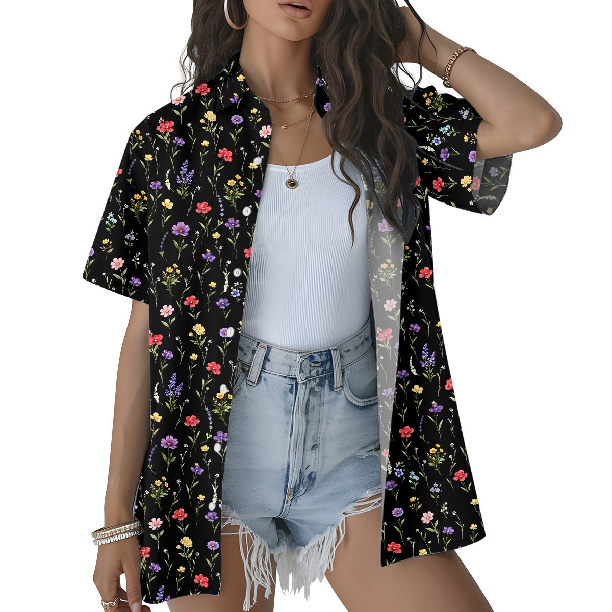 Lifestyle view of a person wearing the black floral hawaiian shirt outdoors