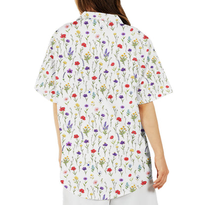 White floral hawaiian shirt featuring scattered wildflowers, back view