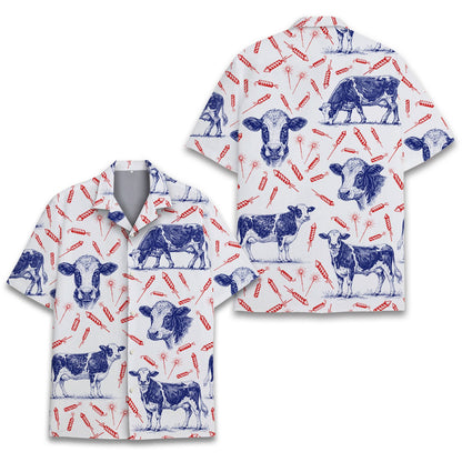 Detail shot highlighting the red firecrackers and blue cows on white fabric