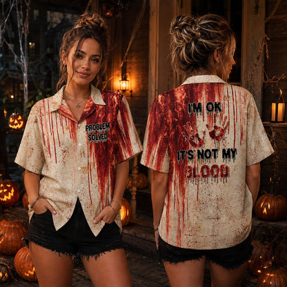 Lifestyle view of a family wearing the blood splatter matching family Hawaiian shirts