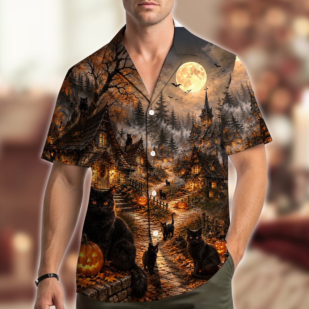 Close up view of the haunted houses and full moon design on the halloween hawaiian shirt