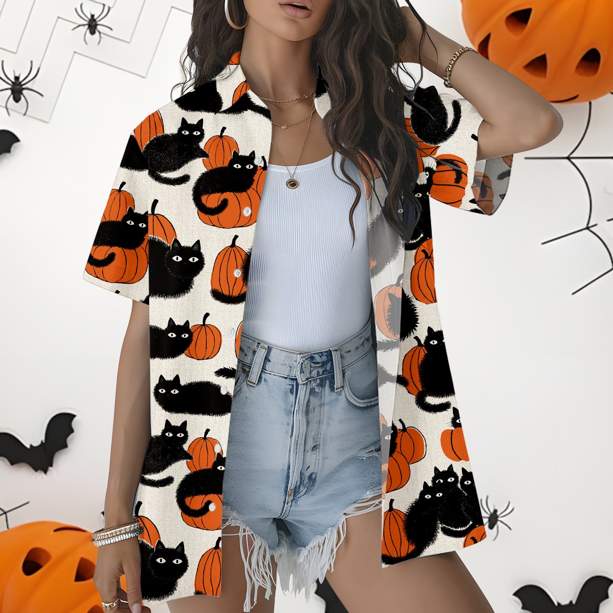 Alternative lifestyle view of matching family hawaiian shirts with Halloween cats and pumpkins.