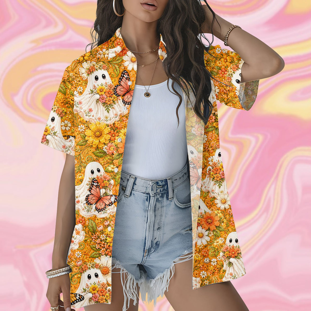 Two people wearing matching family hawaiian shirts with ghost and floral prints